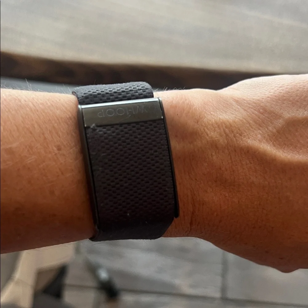 Whoop 4.0 with black band and charger